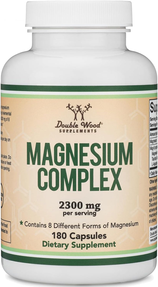 Supplement bottle labeled 'Magnesium Complex' by Double Wood Supplements on a white background